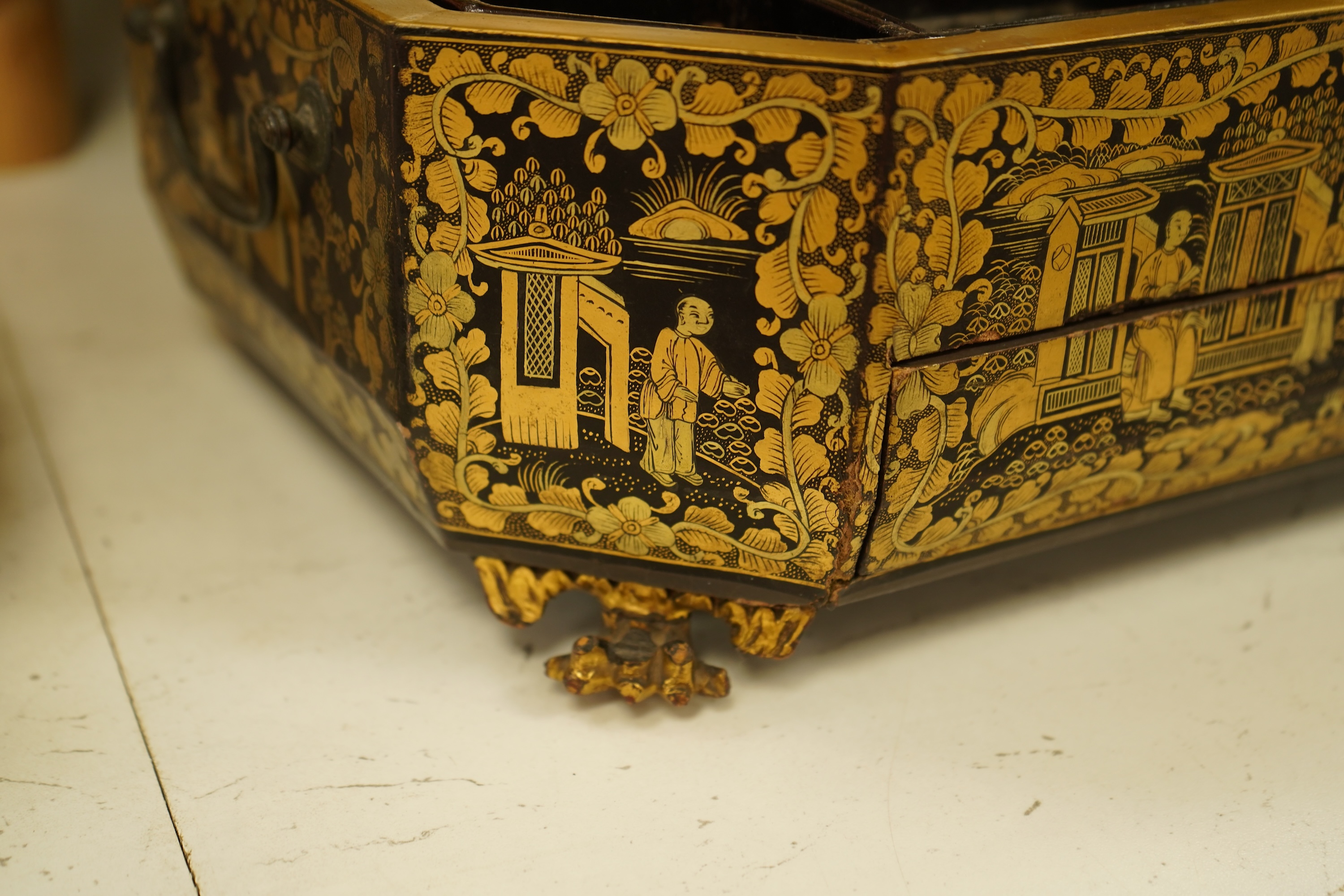 A Chinese export octagonal lacquered work box with fitted interior, 35cm wide